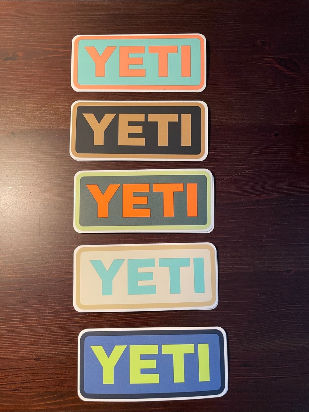 Yeti Multicolor Logo Sticker Set in Orange, Teal, Brown, Lime, and Aqua
